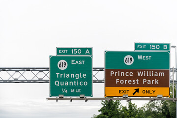 Fototapeta premium Prince William forest park road exit sign for national nature reserve in Northern Virginia by Quantico Triangle for hiking nature trails