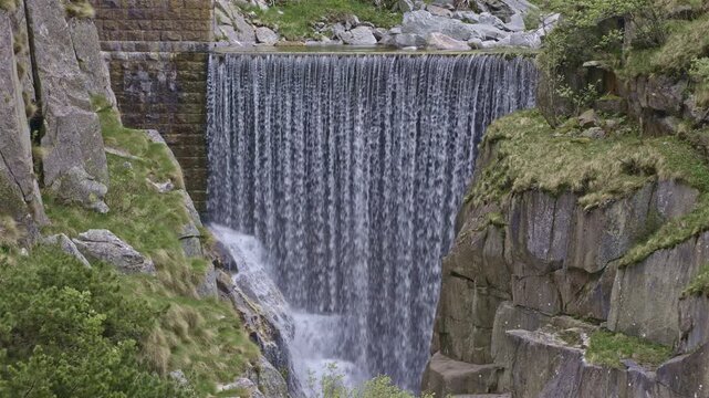 The Reuss man-made cascade in the Schoellenen Gorge, an engineered drop in the river near the Devil&rsquo;s Bridge, Canton of Uri, Switzerland.