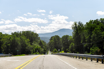 Obraz premium Blue ridge mountains in Nelson county by Afton town, Virginia with road highway view in green summer landscape scenery