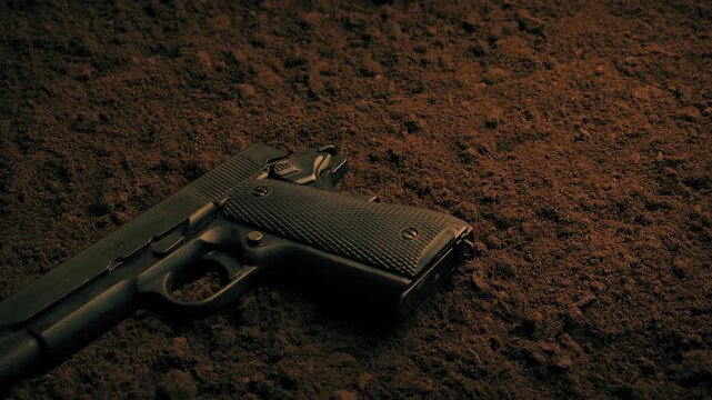 Gun On The Ground Outside
