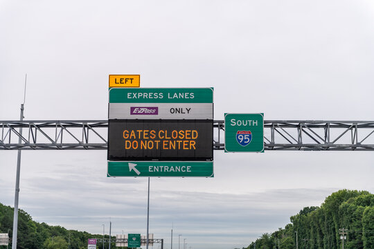 Gainesville, USA - May 27, 2025: Virginia Toll road express highway lanes gates closed do not enter sign for Ezpass only exit