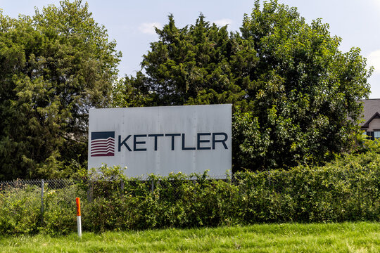 Herndon, USA - May 24, 2025: Kettler investment firm sign on Sully road 28 highway in Virginia with American flag