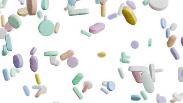 Assorted pills, capsules and tablets falling downward on white background in seamless loop. Clean medical animation for healthcare and pharmaceutical use.