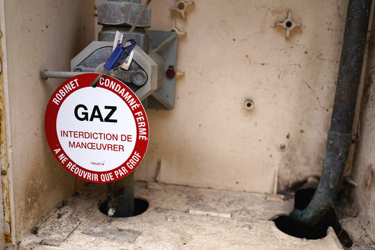 Gas valve locked with red warning tag and security seal for safety and maintenance