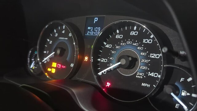 Car Dashboard Gauges Lighting Up During Engine Startup