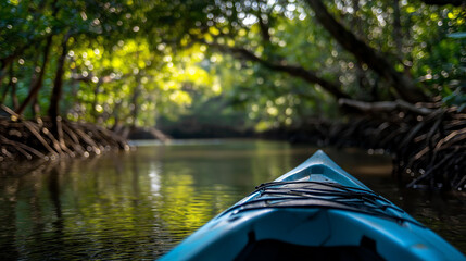 Fototapeta premium Tranquil kayaking experience through lush green mangrove tunnel with sunlight streaming down, serene escape into natural beauty and adventure concept, defocused background, with
