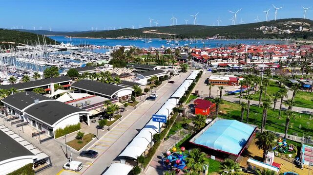Peaceful Aerial View of Teos Marina and Sığacık, Izmir Turkey - Aerial view of Teos Marina and Sığacık in Izmir, Turkey, featuring a peaceful harbor, boats and clear blue Aegean Sea.