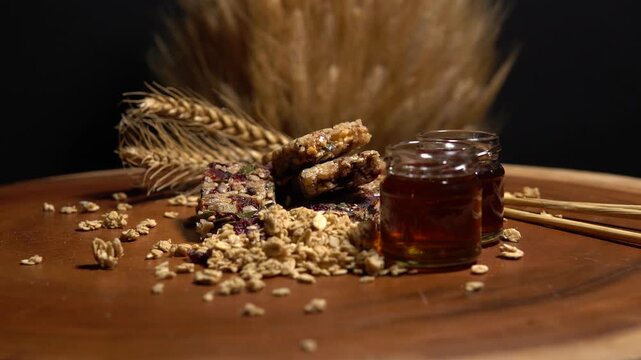 Bars of healthy muesli with honey, berries and nuts, nutritious breakfast and energy food. Fruits, berries and nuts cereal protein bars with honey and rice or cornflakes seeds. Active lifestyle.