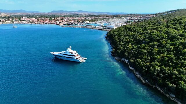 Peaceful Aerial View of Teos Marina and Sığacık, Izmir Turkey - Aerial view of Teos Marina and Sığacık in Izmir, Turkey, featuring a peaceful harbor, boats and clear blue Aegean Sea.