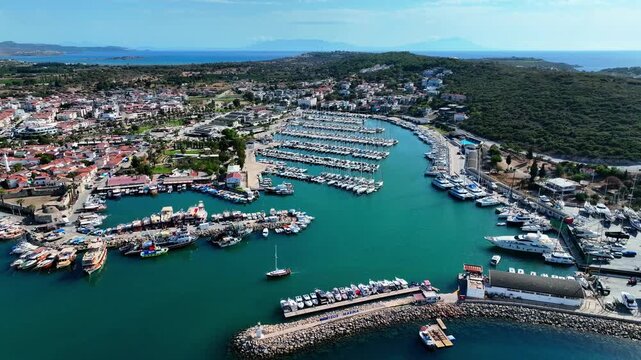 Peaceful Aerial View of Teos Marina and Sığacık, Izmir Turkey - Aerial view of Teos Marina and Sığacık in Izmir, Turkey, featuring a peaceful harbor, boats and clear blue Aegean Sea.