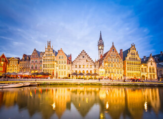 Fototapeta premium Exterior of illuminated buildings with canal, Ghent, Belgium
