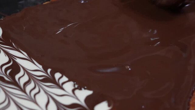 chocolate glaze with white chocolate decoration