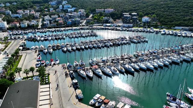 Peaceful Aerial View of Teos Marina and Sığacık, Izmir Turkey - Aerial view of Teos Marina and Sığacık in Izmir, Turkey, featuring a peaceful harbor, boats and clear blue Aegean Sea.