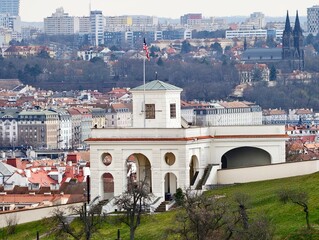 Colonial inspired entrance showcasing detailed craftsmanship and expansive urban panoramas for promotion © Vladimir