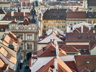 Chimneys roof view. Climb through narrow city rooftops featuring chimneys and historic dormers © Vladimir
