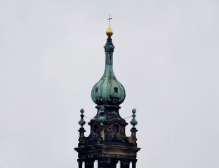 Artistic architecture details. Historic building featuring elaborate goldtopped dome and carved accents © Vladimir