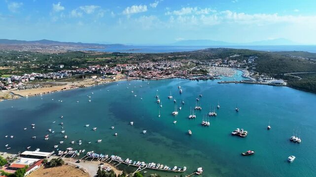 Peaceful Aerial View of Teos Marina and Sığacık, Izmir Turkey - Aerial view of Teos Marina and Sığacık in Izmir, Turkey, featuring a peaceful harbor, boats and clear blue Aegean Sea.