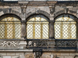 Elegant stonework with intricate details. Ornamental masonry featuring artistic ironwork and carvings © Vladimir