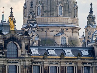 Textural examination of ornate rooftop with sculptural elements showing age and craftsmanship © Vladimir