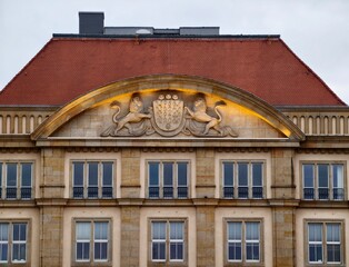Elegant decorative building. Architectural monument featuring sculptures and classic design © Vladimir