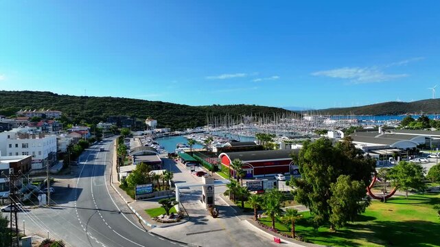 Peaceful Aerial View of Teos Marina and Sığacık, Izmir Turkey - Aerial view of Teos Marina and Sığacık in Izmir, Turkey, featuring a peaceful harbor, boats and clear blue Aegean Sea.