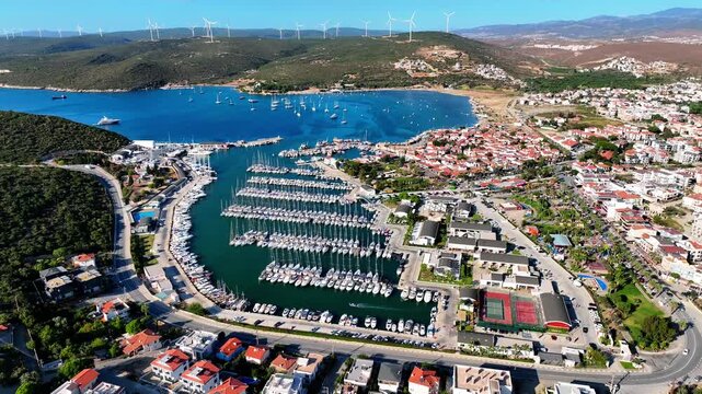 Peaceful Aerial View of Teos Marina and Sığacık, Izmir Turkey - Aerial view of Teos Marina and Sığacık in Izmir, Turkey, featuring a peaceful harbor, boats and clear blue Aegean Sea.
