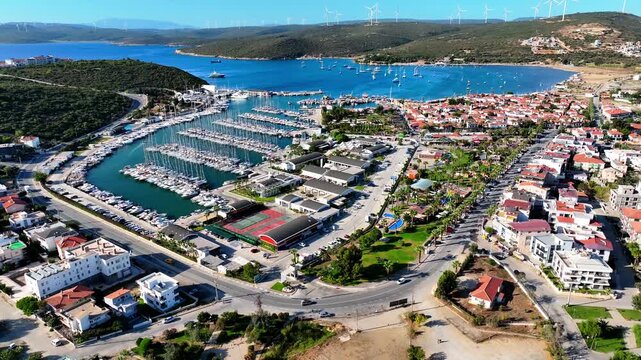 Peaceful Aerial View of Teos Marina and Sığacık, Izmir Turkey - Aerial view of Teos Marina and Sığacık in Izmir, Turkey, featuring a peaceful harbor, boats and clear blue Aegean Sea.