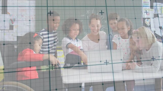 Child handling bag starting students gathering at laptop with teacher leaning in class, grid marks