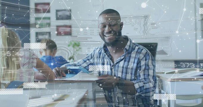 Male teacher reaching with blue tool, flipping workbook and guiding classwork while HUD shifting