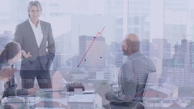 Male presenter pressing remote and showing red chart demonstrating growth, business team clapping