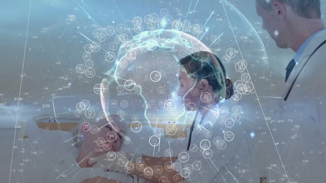 Nurse leaning over patient checking vitals in hospital while holo globe appearing, informing care