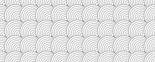 Seamless geometric pattern featuring black and white concentric circles in a fish scale layout © Sutana