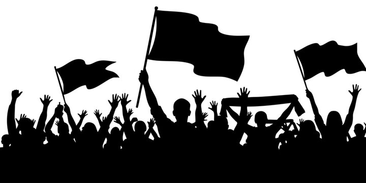 Crowd waves flags and cheers in a lively demonstration atmosphere downtown.