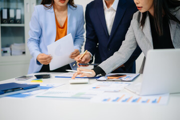 Fototapeta premium Business team collaboration discussing working analyzing with financial data and marketing growth report graph in team, presentation