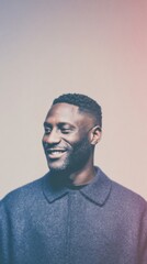 Obraz premium Smiling African Man in Professional Portrait Looking Aside Against Neutral Gradient Background for Social Media Profile or Corporate Branding with Copy Space