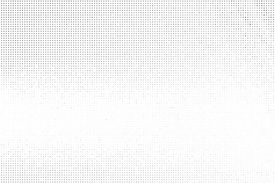 Abstract halftone dotted background. Grunge effect vector texture