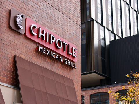 Chipotle Mexican Grill restaurant exterior on a city street in Kendall Square, Cambridge, Massachusetts