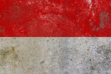 Indonesia national flag painted on textured wall mural background © Cristian Valderas