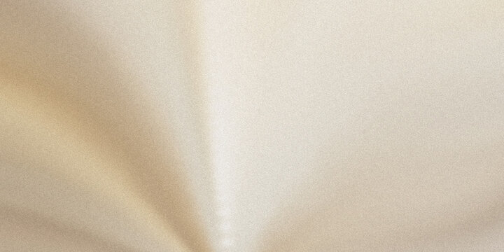 Close-up view of a beige, textured fabric surface with slight creases and folds