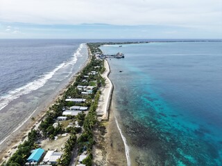 FUNAFUTI, TUVALU - MARCH 2026: Aerial view of the "Te Namamo" seawall, meaning "calming the waves" in Tuvaluan, constructed under the TTCAP project funded by Taiwan. © Endo Shuichi