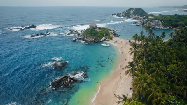 Stunning Tayrona Park Beach: Blue Waters, Palm Trees & Coastal Hut