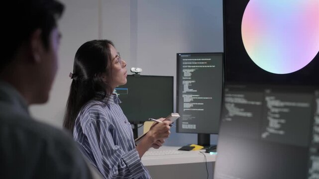 Programmer software developer engineer online meeting with AI artificial intelligence personal assistant, technology business digital transformation concept