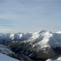 Fairytale views of the snow-capped mountain peaks in the Polish Tatra Mountains © DRONAURA