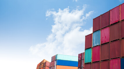 Fototapeta premium Cargo ship container goods export import international transport on blue sky background, warehouse industry business logistics transportation harbor port industrial shipping terminal cargo ship.
