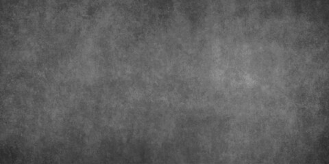 Obraz premium Dark black old wall paper grunge background. black blackboard and chalkboard texture. Dark black concrete wall texture element vintage grunge charcoal paint rough, distress backdrop background.
