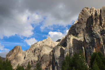 Fototapeta premium Alpine Dolomites panorama under cloudy horizon