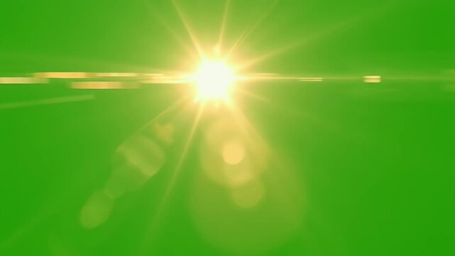 Bright sunburst with lens flares against a vivid green background