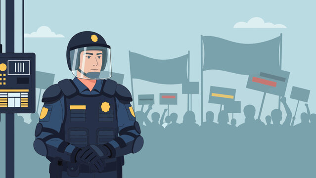 Police officer in riot gear standing guard.