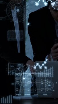 Vertical video of an office scene featuring several businesspeople conducting AI data analysis as part of a workflow improvement initiative, with their fingers pointing , without faces 