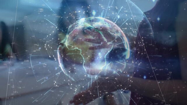 Teacher's hands cupping and nudging 3D globe, causing rotating nodes and links for home learning